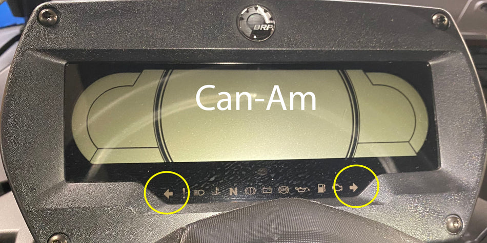 Can-Am UTV instrument cluster with turn signal arrows. 