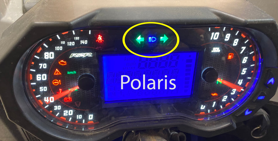 Polaris UTV instrument cluster with turn signal indicators. 